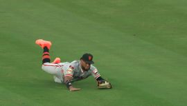 San Francisco Giants' Austin Slater (13), Luis Matos (29), and