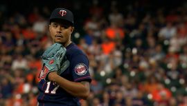 Minnesota Twins relief pitcher Cody Stashak (61) throws from the mound  during the fifth inning of a baseball game against the Tampa Bay Rays,  Saturday, April 30, 2022, in St. Petersburg, Fla. (