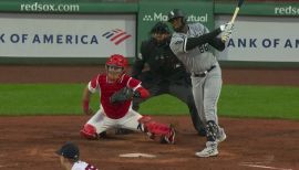 Luis Robert Jr. #88 and Andrew Benintendi of the Chicago White Sox