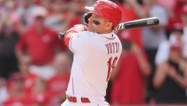 Los Angeles, Unites States. 28th Apr, 2021. Cincinnati Reds' Kyle Farmer  (17) celebrates with teammate Joey Votto (19) after tying the game 3-3 on  the RBI single by Jesse Winker in the