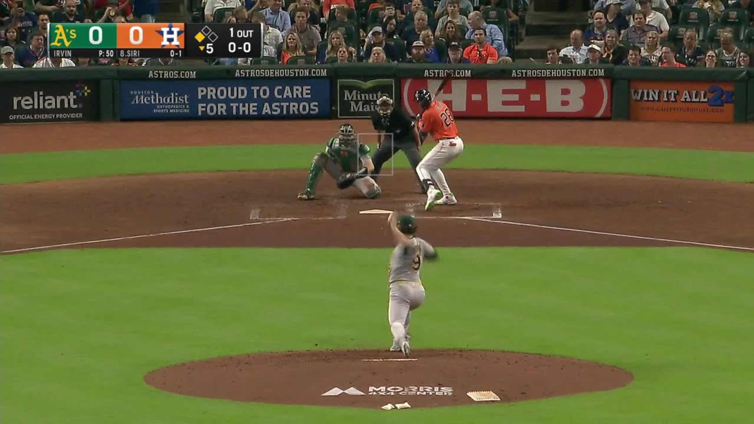 Jose Siri of the Houston Astros makes a catch on a fly ball by Myles