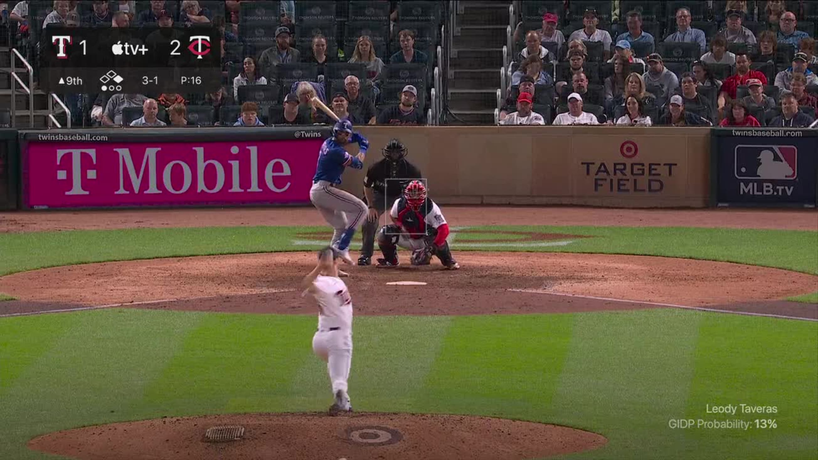 Texas Rangers outfielders Charlie Culberson, left, Leody Taveras