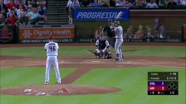 Nolan Arenado homers (1) on a fly ball to left center field.  