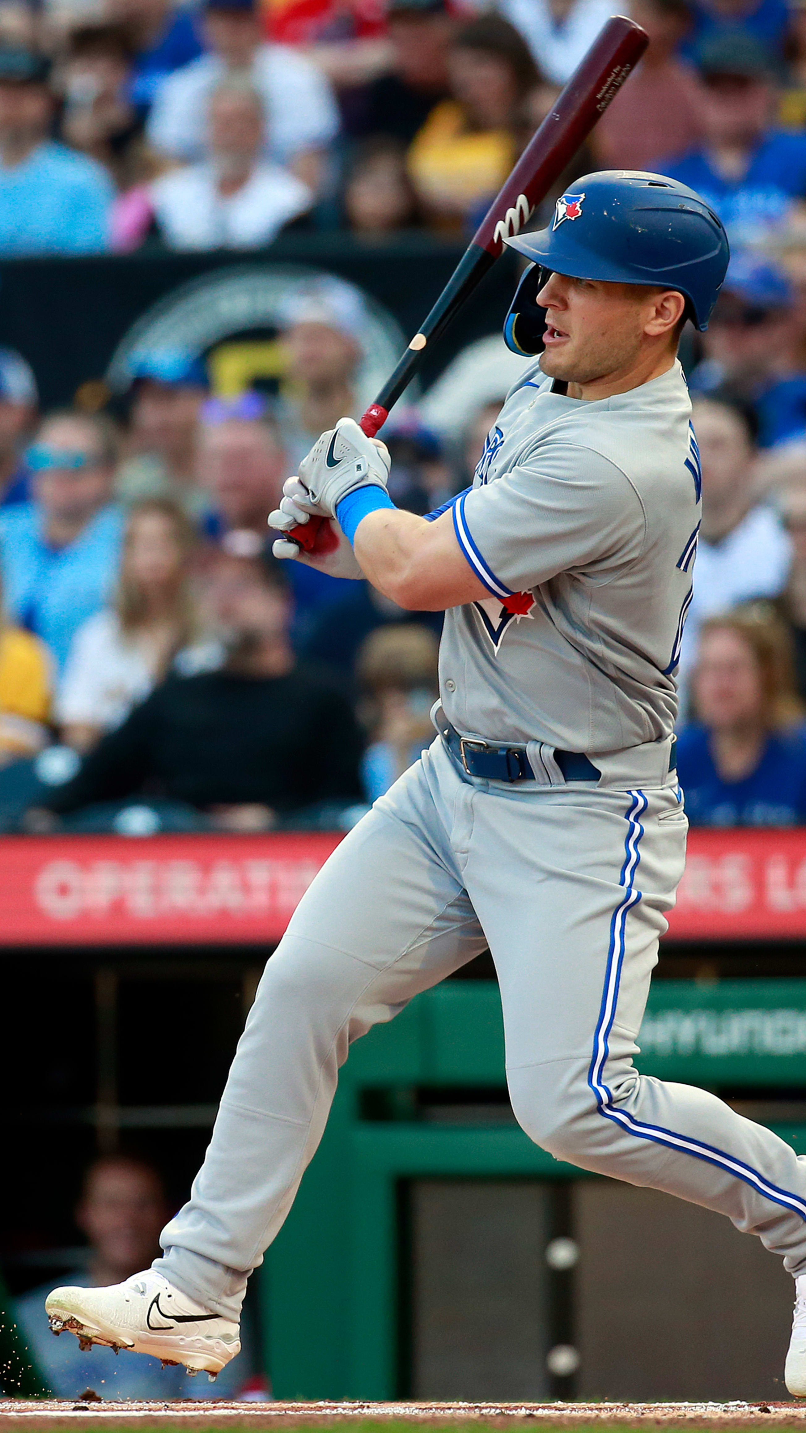 Toronto Blue Jays left fielder Daulton Varsho (25) swings at the