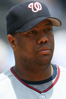 Former MLB pitchers Livan Hernandez, left, and his half-brother