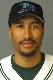 Seattle Mariners' Randy Wynn watches his grand slam home run off