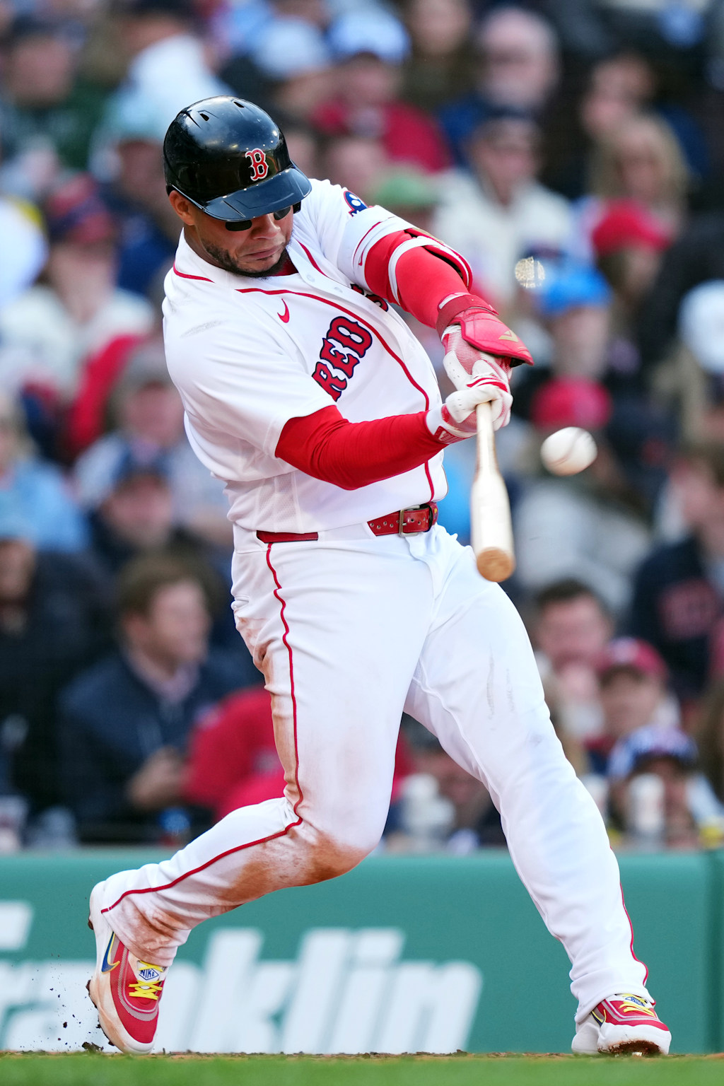 Boston Red Sox catcher Willson Contreras taking a swing at Fenway Park, the .941 OPS bat carrying a fifteen-game Boston winning streak into the doubleheader nightcap against Baltimore