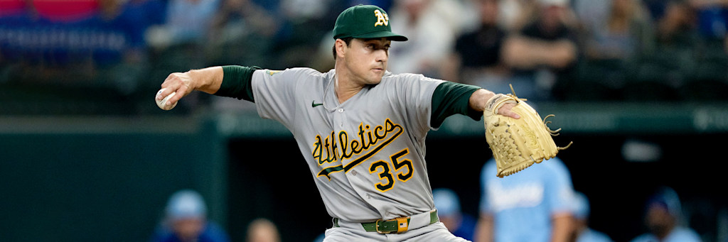 Oakland Athletics right-handed pitcher J.T. Ginn delivering from the mound during a 2026 MLB regular season start, green and gold uniform in frame