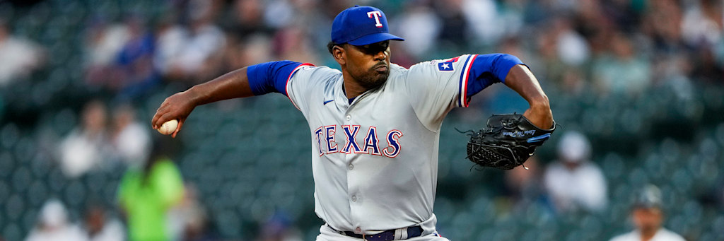 Kumar Rocker of the Texas Rangers delivering a pitch