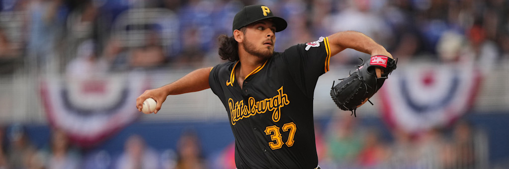 Pittsburgh Pirates starting pitcher Jared Jones delivering a pitch in action