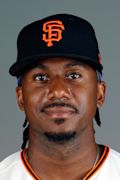 Headshot of Lewis Brinson