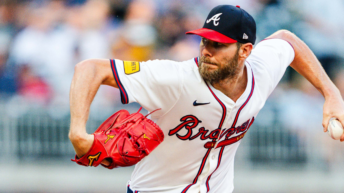 Atlanta Braves starting pitcher Chris Sale delivering a pitch in action