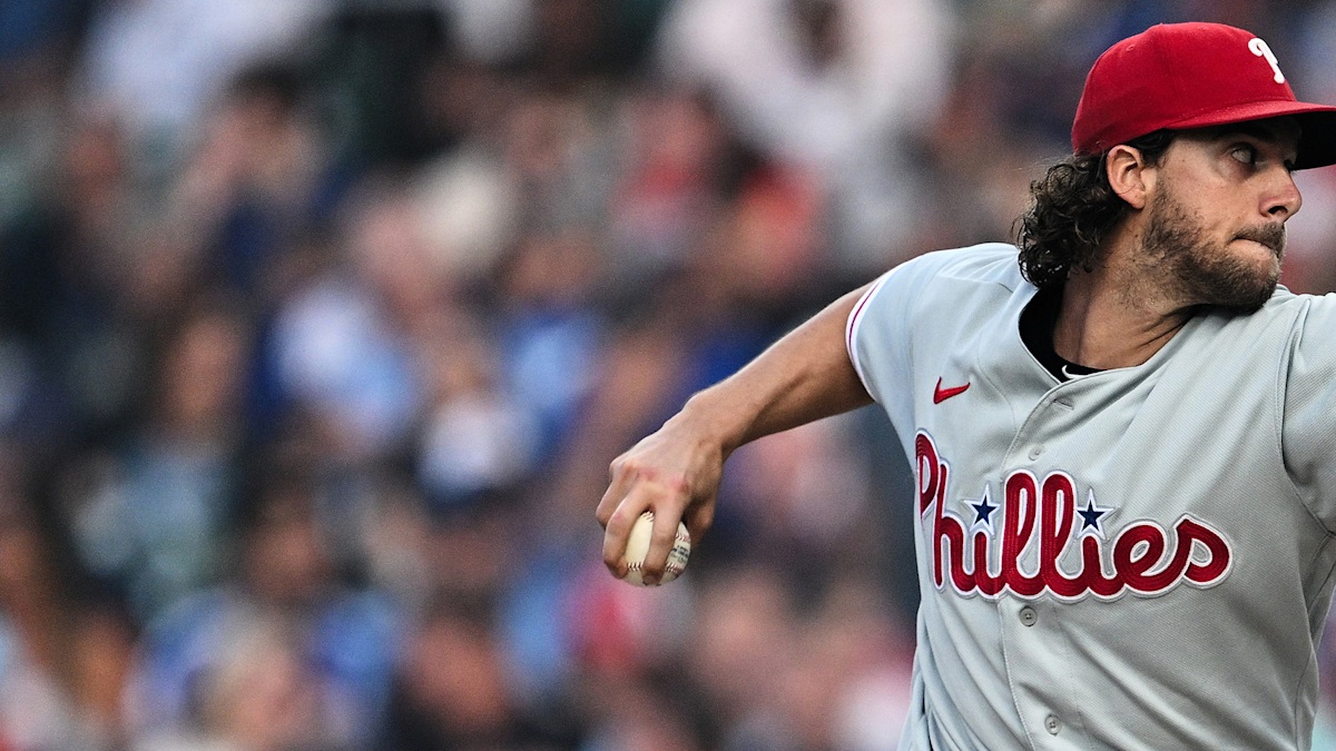 Philadelphia Phillies right-hander Aaron Nola in his pitching delivery before his start against the Twins at the Field of Dreams in Dyersville, Iowa