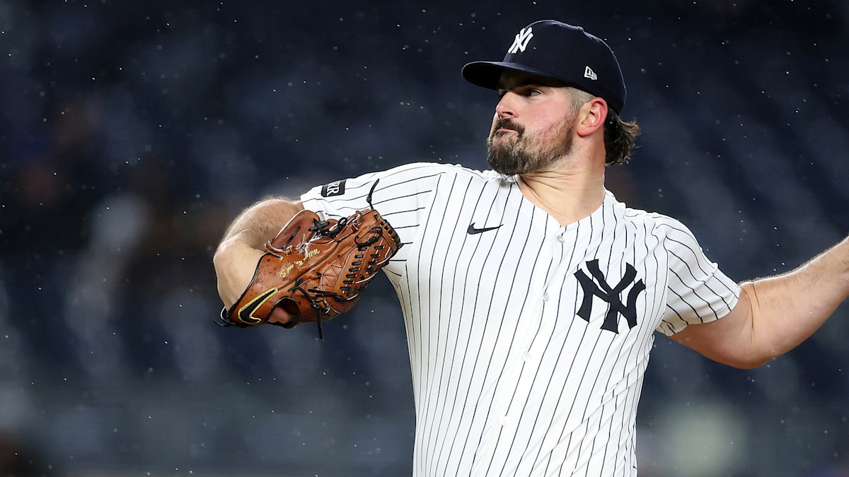New York Yankees starting pitcher Carlos Rodon delivering a pitch in action