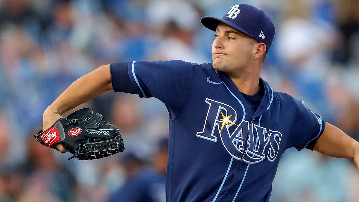 Tampa Bay Rays starting pitcher Shane McClanahan delivering a pitch in action
