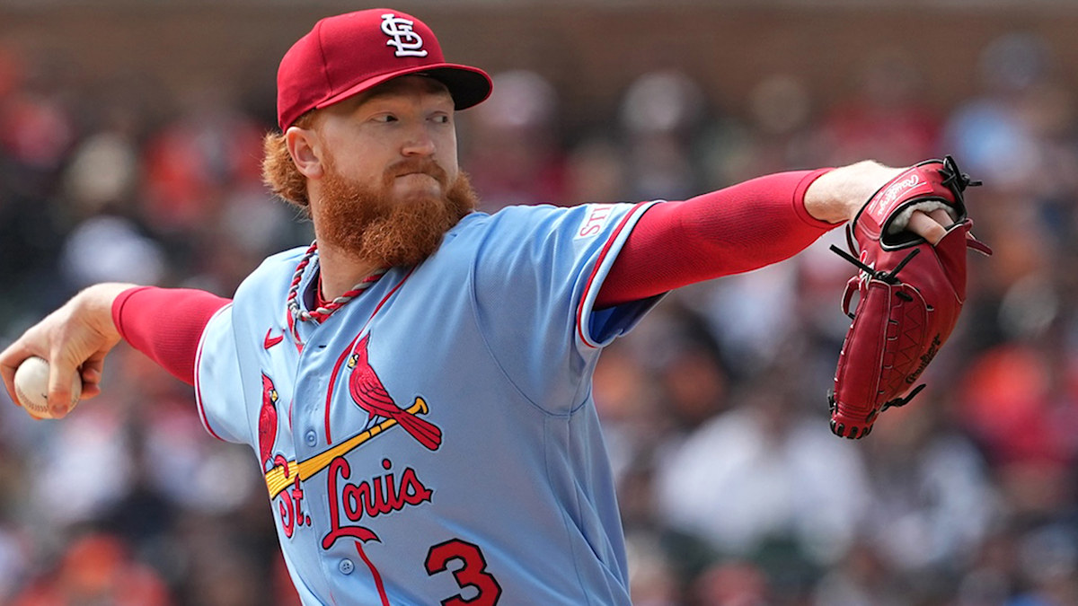 St. Louis Cardinals pitcher Dustin May delivering a pitch in action