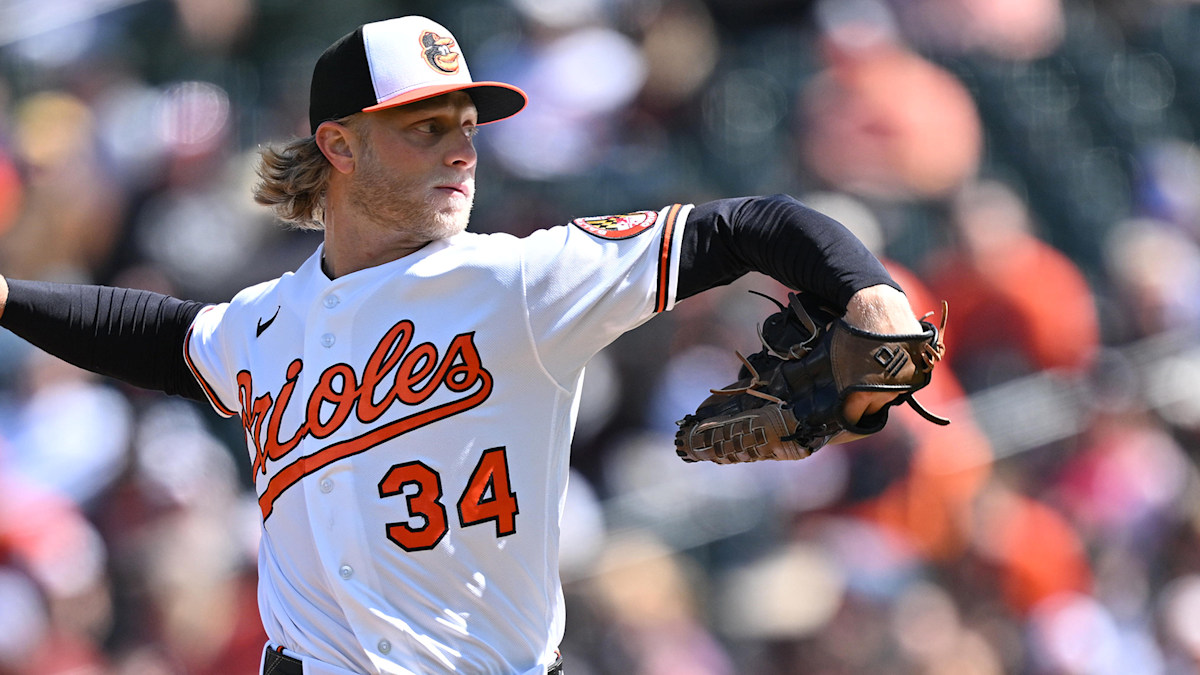 Baltimore Orioles starting pitcher Shane Baz delivering a pitch in action