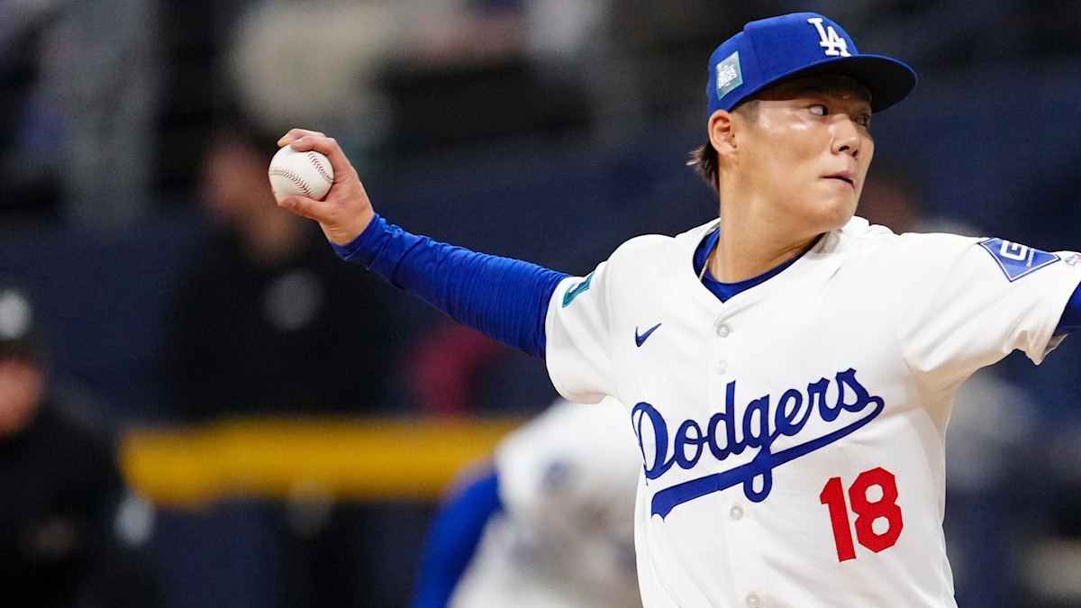 Starting pitcher Yoshinobu Yamamoto delivering a pitch in action
