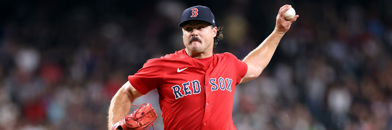 Boston Red Sox left-hander Payton Tolle driving toward the plate mid-delivery