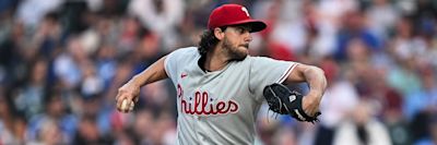 Aaron Nola pitching action photo