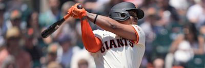 Rafael Devers batting action photo