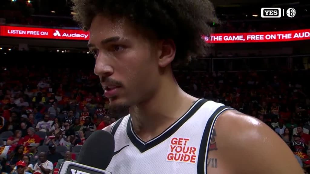 Jalen Wilson talks to Meghan Triplett at halftime 