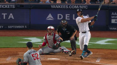 Giancarlo Stanton launches a home run to the Yankees' bullpen