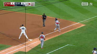 Yankees turn slick double play to end seventh inning