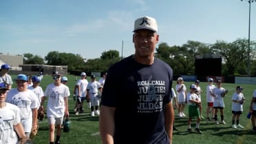 Aaron Judge holds his summer pro camp