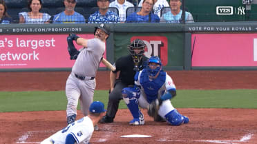 Austin Wells drives a three-run shot to right
