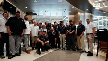Yankees players thank game day staff for their efforts during the season