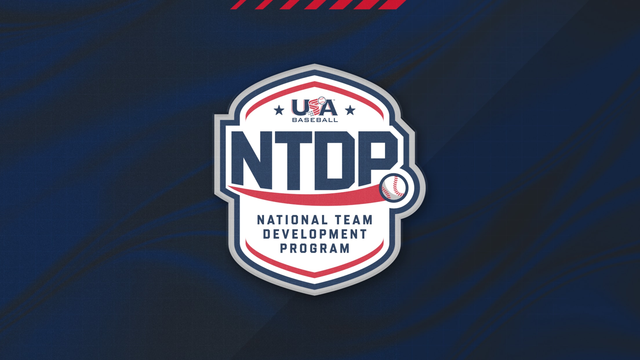 National Team Development Program logo on a navy blue background.