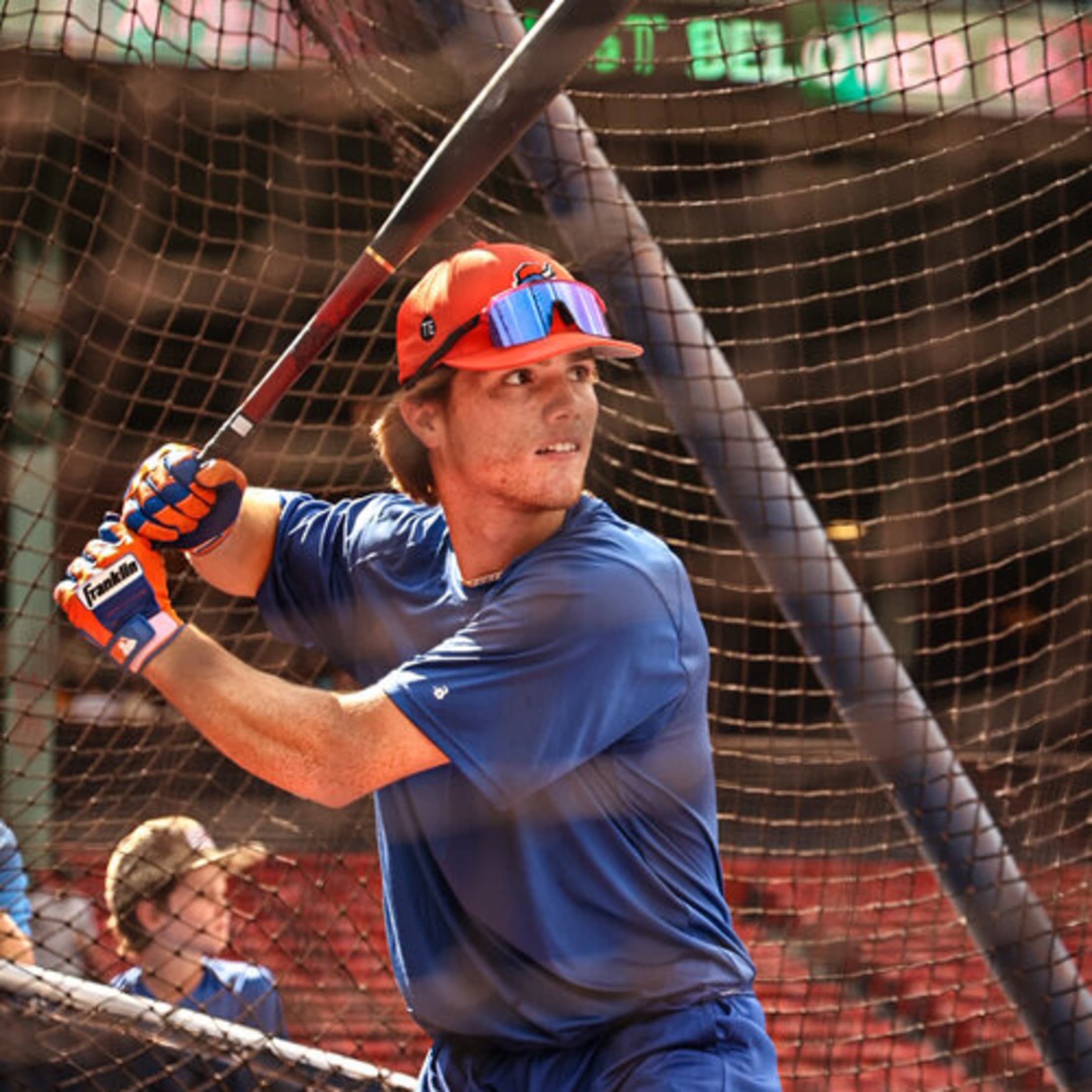 A right-handed batter takes swings during BP.