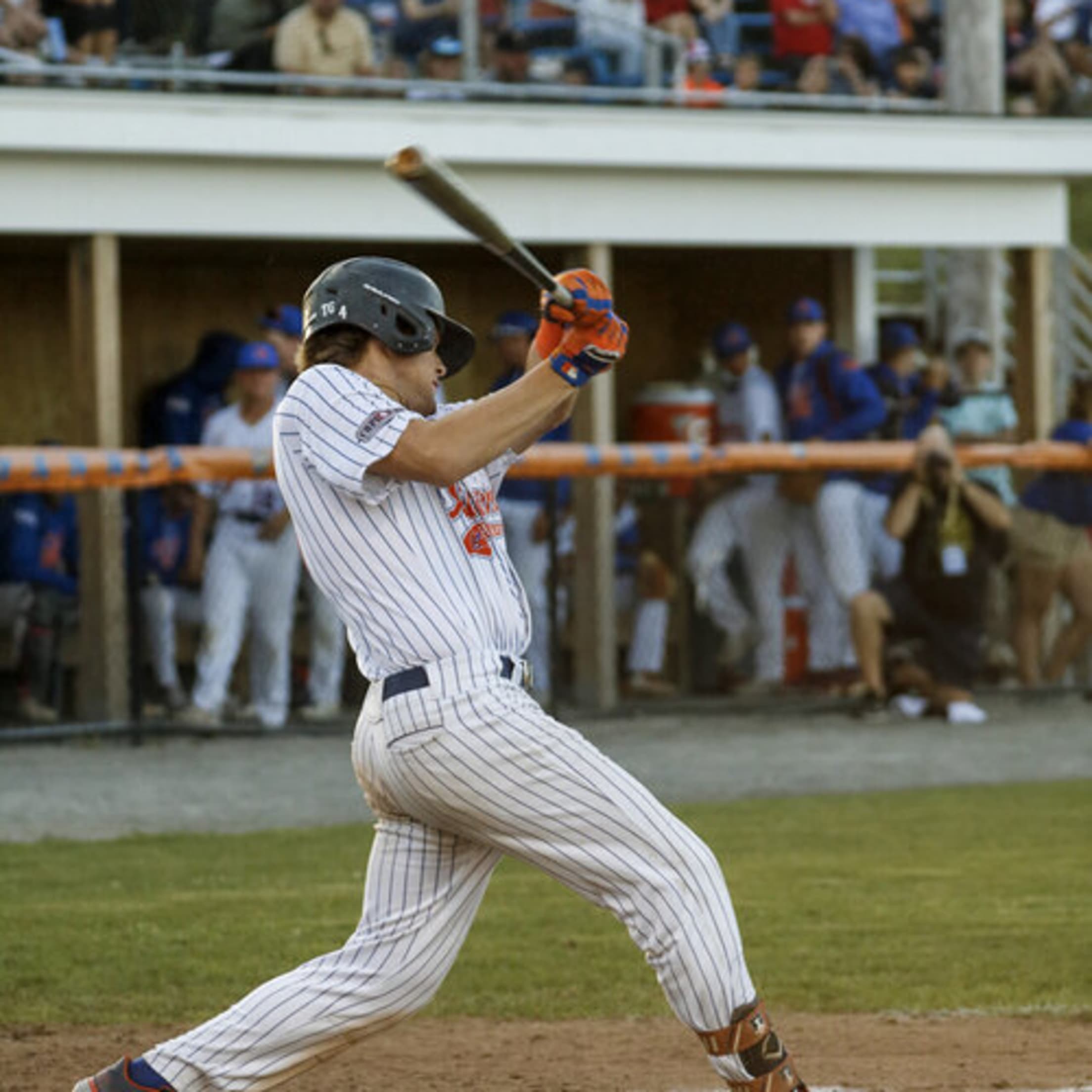 A lefty takes a mighty swing during game action.
