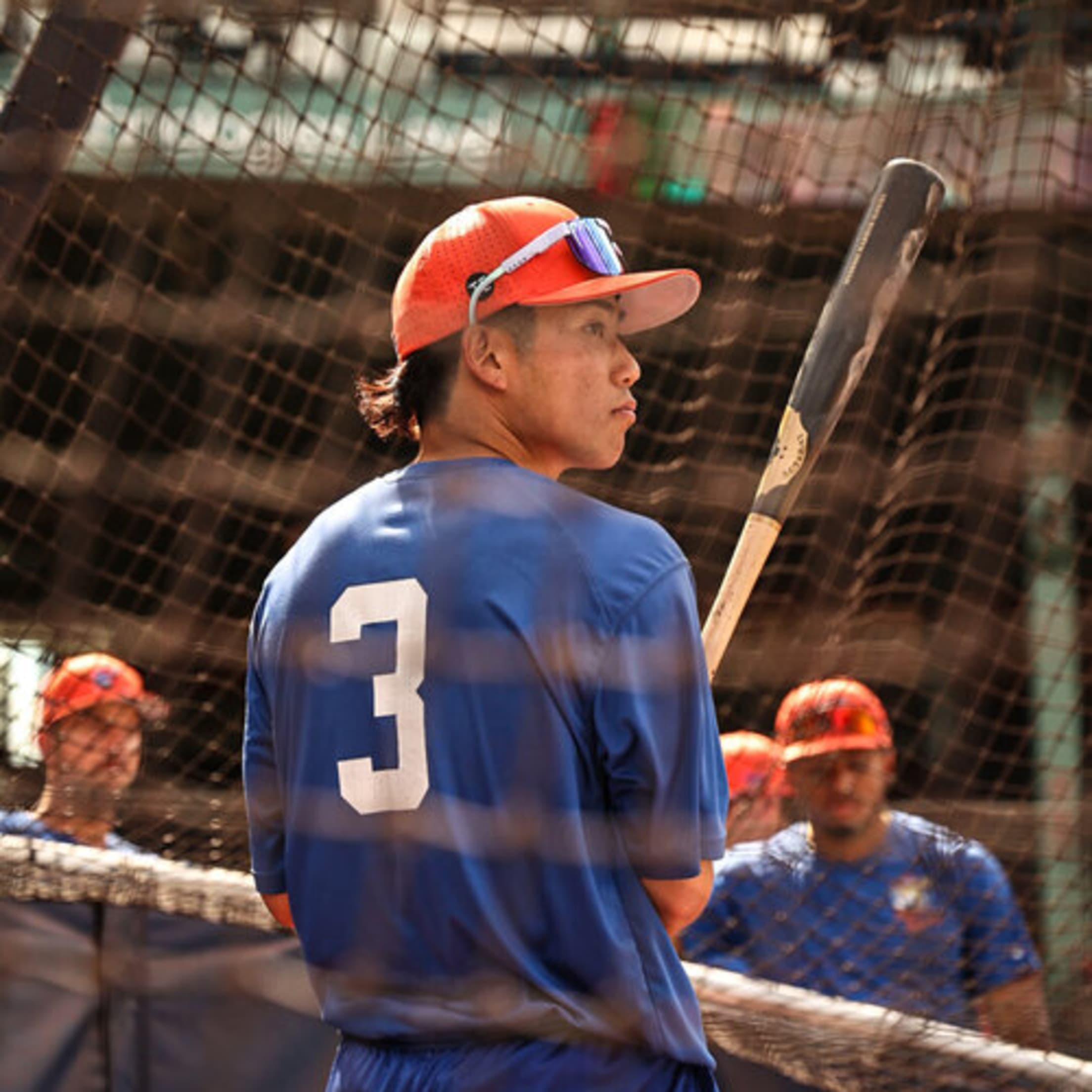 A Hyannis player looks out towards his coach while taking live batting practice.