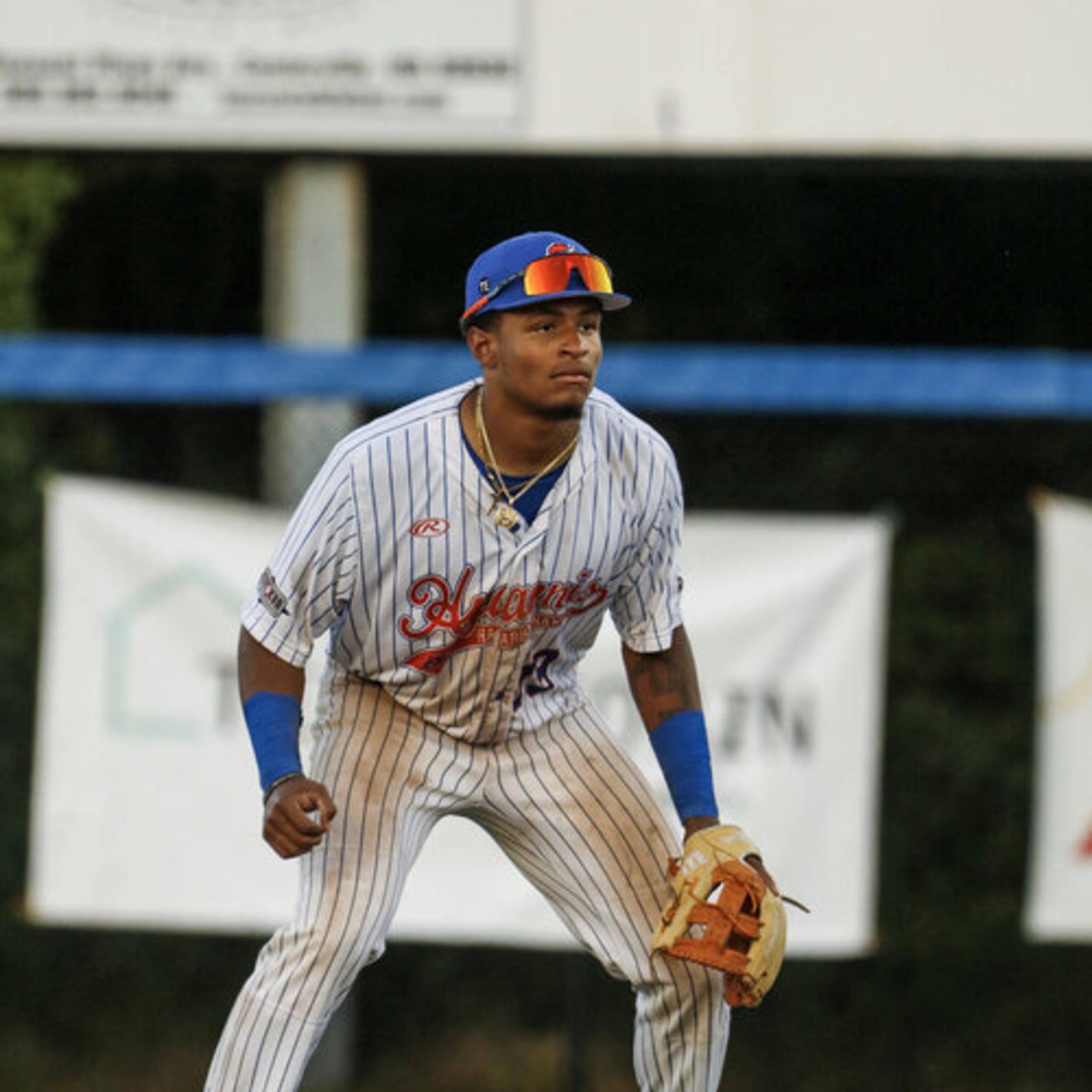 A young infielder gets ready to field a groundball for Hyannis.