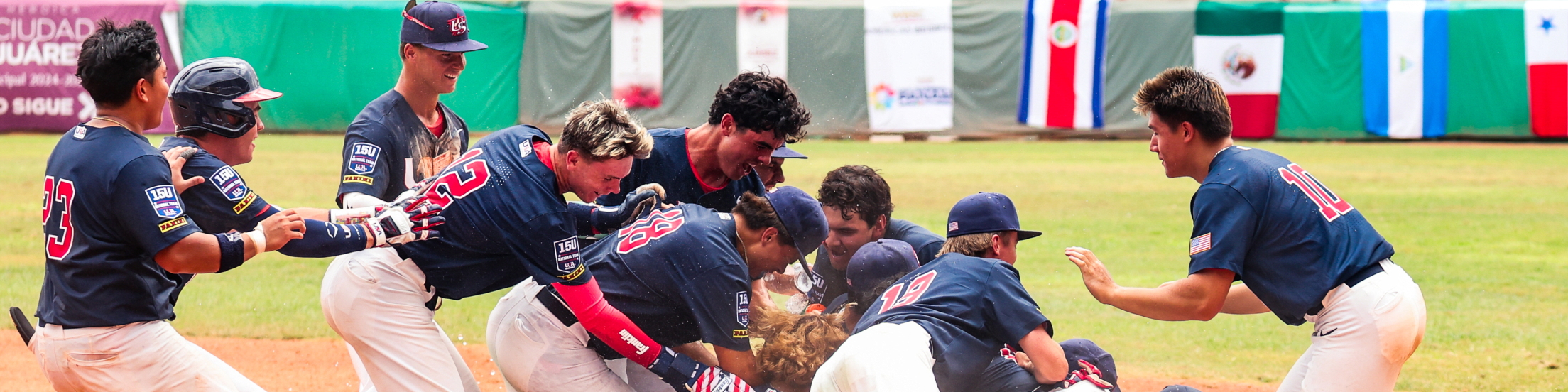 Group of baseball players celebrating in a dogpile